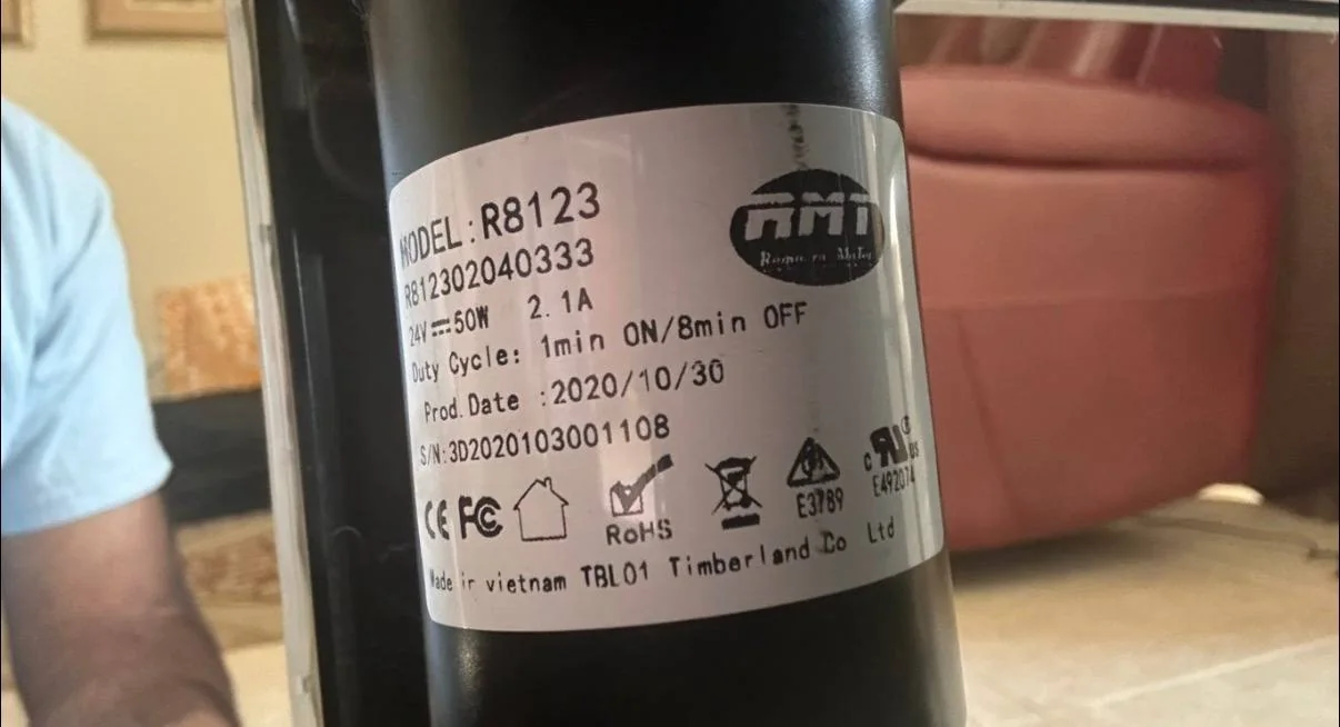 Recliner motor label photographed to identify the correct part