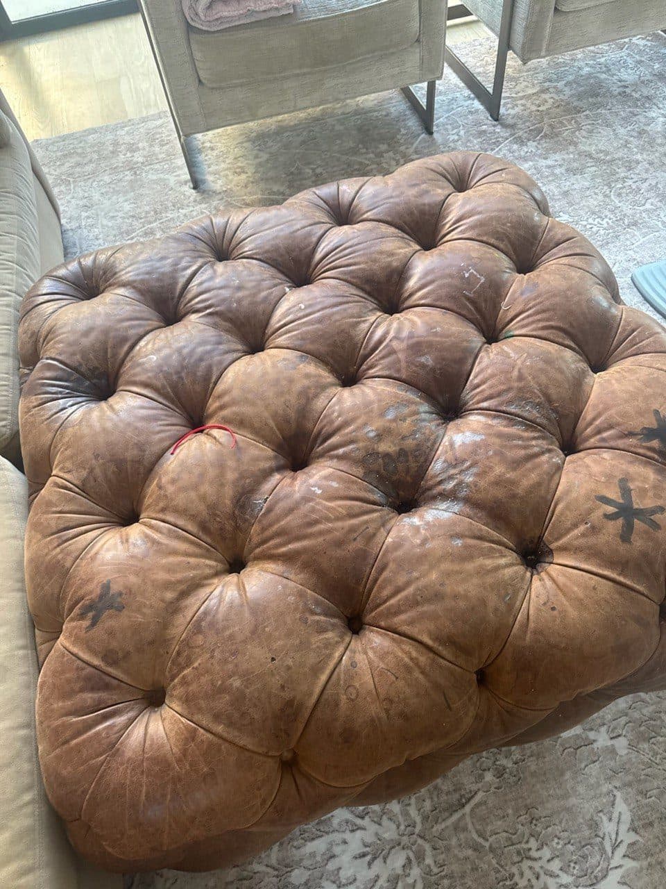 Before: Tufted Leather Full Grain Ottoman Stain Removal And Color Restoration