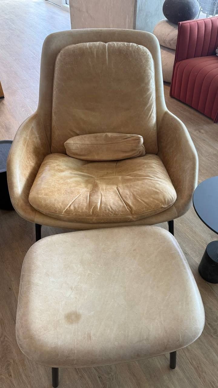 Before: Aniline Leather Chair And Ottoman Stain Removal And Color Restoration