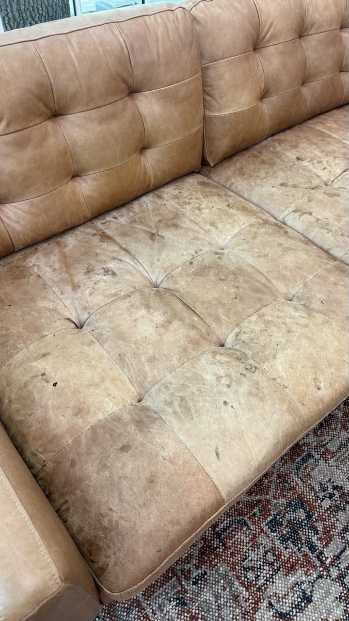 Before: Aniline Leather Sofa Stain Removal And Color Restoration