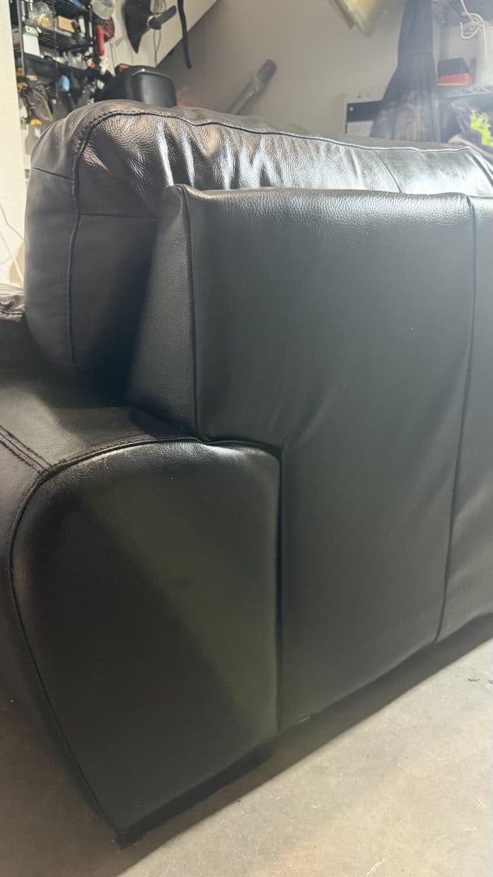 After: Black Leather Sofa Pet Damage Repair And Panel Restoration